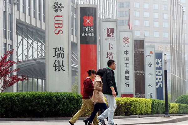 Chinese banks face “improved operating environment,” Fitch