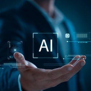 Businessman using artificial intelligence (AI) technology in future business, using artificial intelligence to make business more efficient, IoT, innovation and the future.